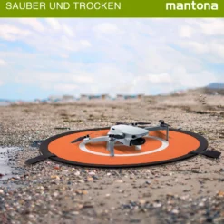 Mantona Drohnen-Landeplatz faltbar Ø 55 cm wetterfest mit Metallheringen kompakt auf 23 cm faltbar mit Transporttasche und beidseitiger H-Markierung
