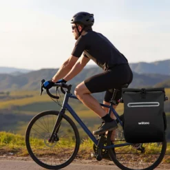 Wiltec Gepäckträgertasche schwarz, Fahrradtasche Rucksack 20 l Stauraum, Gepäcktasche mit Laptopfach, wasserresistente Fahrrad Tasche